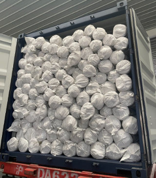 Container met gordijnstof